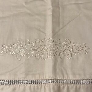Valance, white embroidery details. 84” x 18”